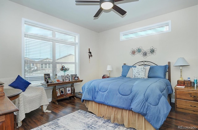 27665 County Road 313 Unit 11, Buena Vista, CO 81211 - bedroom featuring multiple windows, wood finished floors, and a ceiling fan