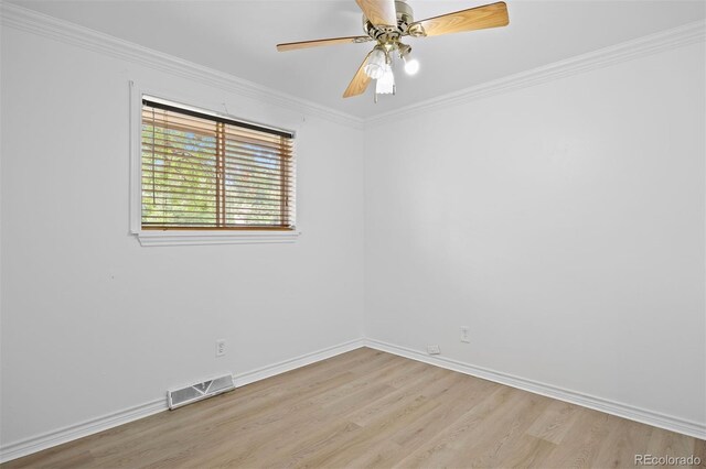 971 S Ironton St, Aurora, CO 80012 - empty room with light wood finished floors, crown molding, and ceiling fan