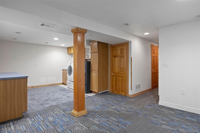 971 S Ironton St, Aurora, CO 80012 - finished below grade area with dark colored carpet, washer / dryer, and recessed lighting
