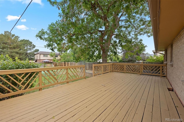 971 S Ironton St, Aurora, CO 80012 - wooden terrace featuring a fenced backyard