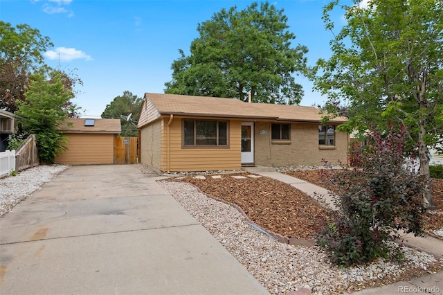 971 S Ironton St, Aurora, CO 80012 - ranch-style home with concrete driveway and brick siding