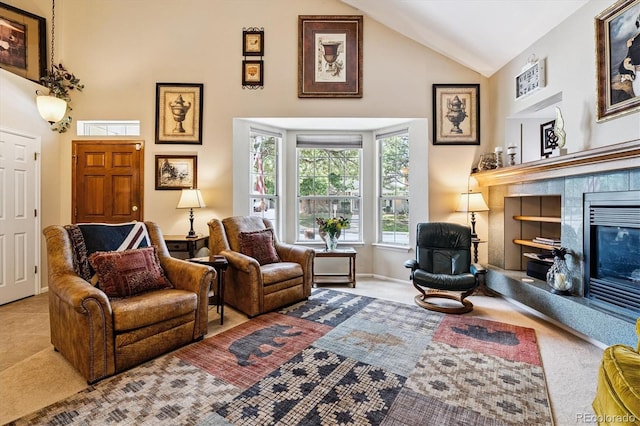 2992 W Long Dr Unit A, Littleton, CO 80120 - carpeted living area featuring high vaulted ceiling and a tiled fireplace