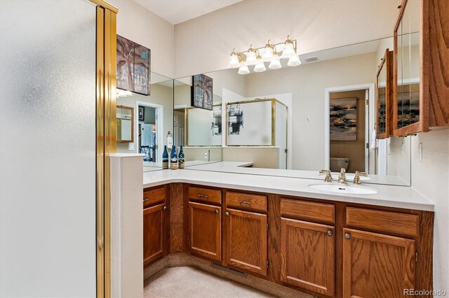2992 W Long Dr Unit A, Littleton, CO 80120 - bathroom featuring a stall shower and vanity