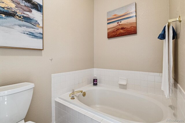2992 W Long Dr Unit A, Littleton, CO 80120 - bathroom with a garden tub and toilet