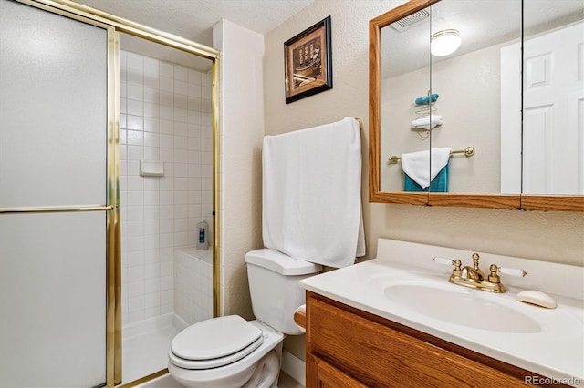2992 W Long Dr Unit A, Littleton, CO 80120 - bathroom with a shower stall, vanity, and a textured ceiling