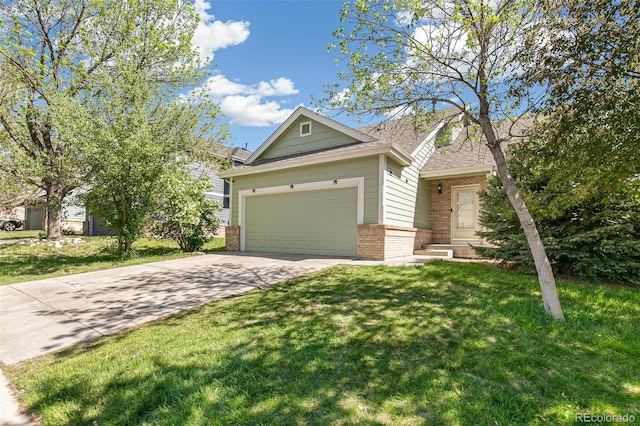view of front facade with brick siding, driveway, an attached garage, and a front lawn