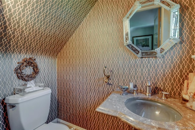 199 Lafayette St, Denver, CO 80218 - half bath featuring a sink and wallpapered walls