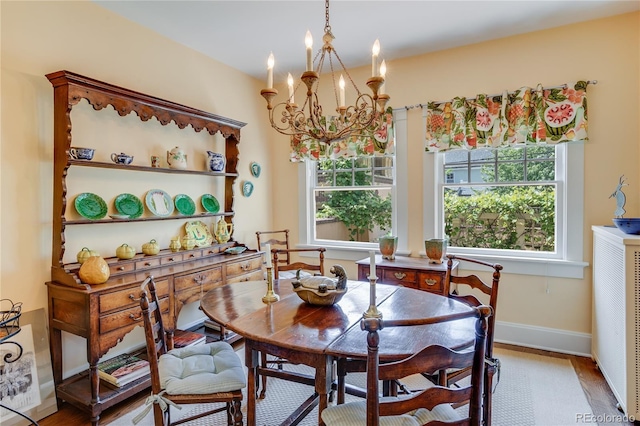 199 Lafayette St, Denver, CO 80218 - dining space with a chandelier, plenty of natural light, and light wood-style floors
