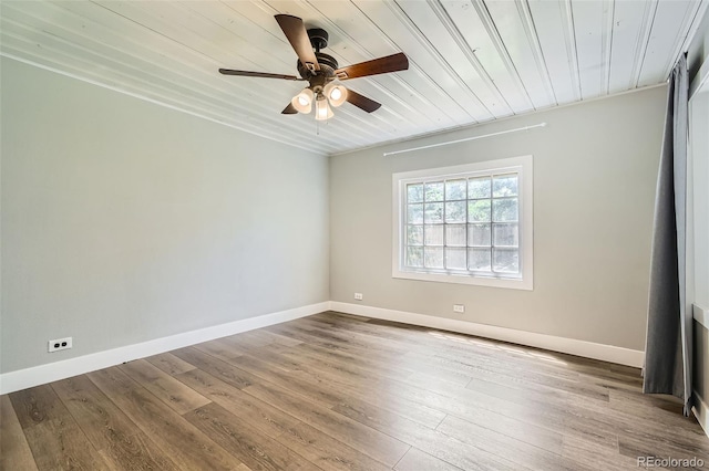 2726 W 1st Ave, Denver, CO 80219 - spare room with a ceiling fan, wood finished floors, and wooden ceiling