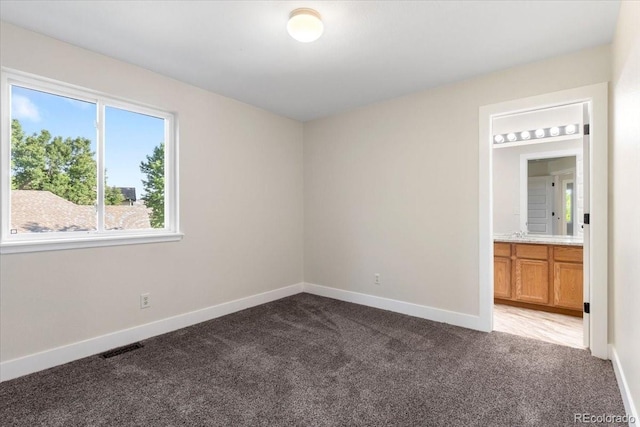 2089 Meadow Sweet Ln, Erie, CO 80516 - unfurnished bedroom with carpet floors and ensuite bathroom