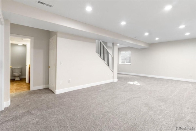 2089 Meadow Sweet Ln, Erie, CO 80516 - basement with carpet floors, recessed lighting, and stairway