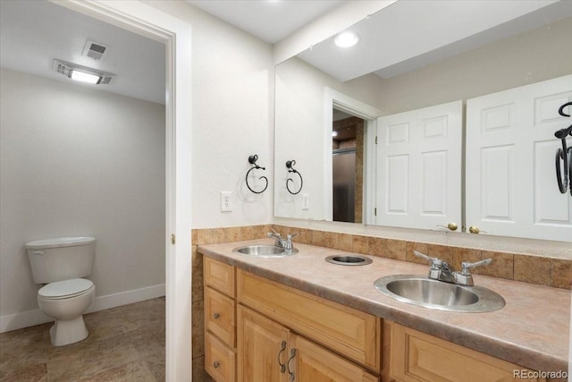 2089 Meadow Sweet Ln, Erie, CO 80516 - bathroom featuring double vanity and tile patterned flooring