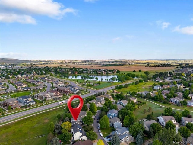 2089 Meadow Sweet Ln, Erie, CO 80516 - aerial view of property's location with a large body of water and nearby suburban area
