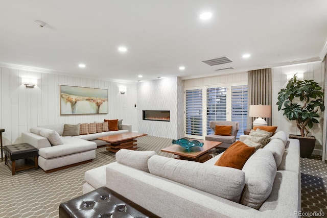 130 N Pearl St Unit 1103, Denver, CO 80203 - living area featuring visible vents, ornamental molding, carpet, and a fireplace