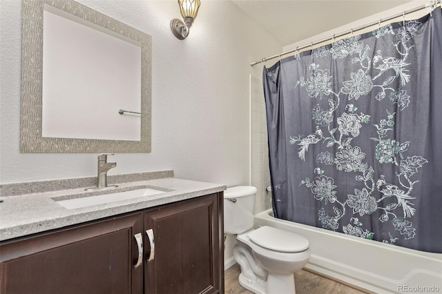 full bathroom featuring toilet, vanity, shower / tub combo with curtain, and hardwood / wood-style floors