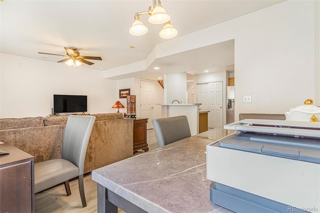 5895 Biscay St Unit D, Denver, CO 80249 - dining room featuring ceiling fan, light wood-style flooring, and recessed lighting