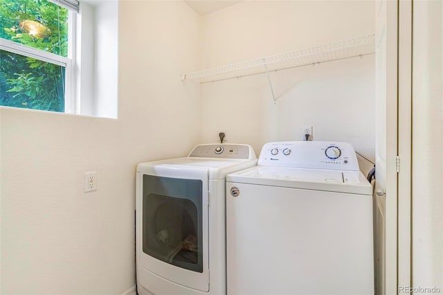 5895 Biscay St Unit D, Denver, CO 80249 - washroom featuring independent washer and dryer