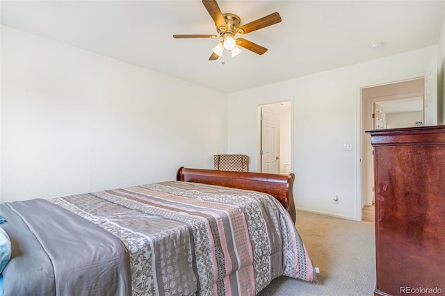 5895 Biscay St Unit D, Denver, CO 80249 - bedroom with carpet flooring, ceiling fan, and baseboards