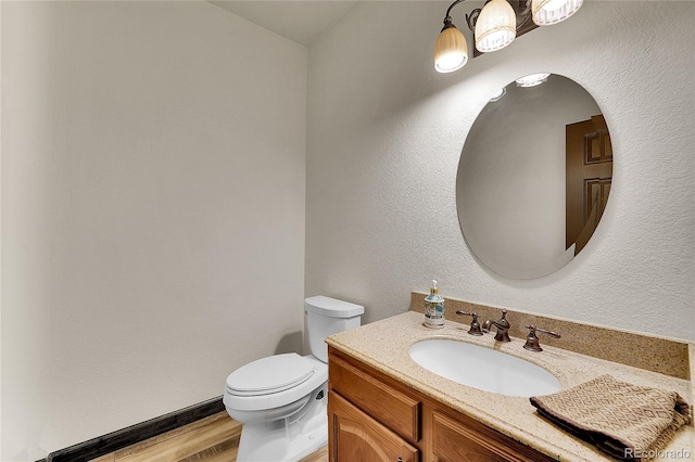 2972 W Long Dr Unit C, Littleton, CO 80120 - bathroom featuring vanity and wood finished floors