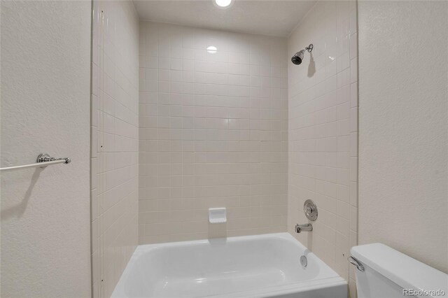 2972 W Long Dr Unit C, Littleton, CO 80120 - bathroom with a textured wall and tub / shower combination