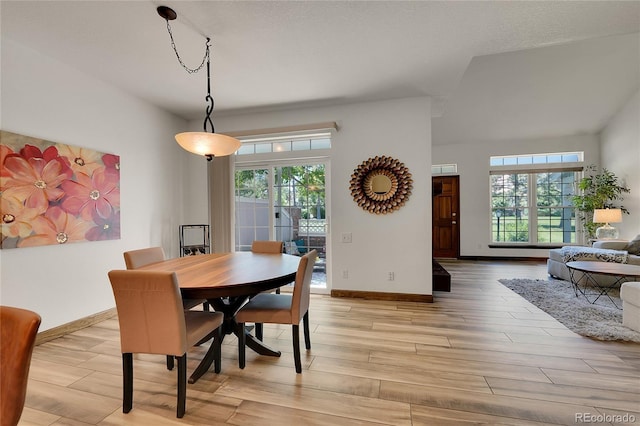 2972 W Long Dr Unit C, Littleton, CO 80120 - dining area with light wood-style flooring and baseboards