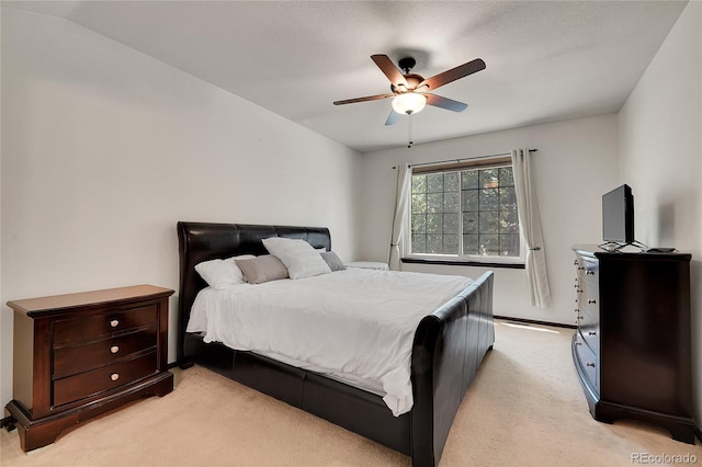 2972 W Long Dr Unit C, Littleton, CO 80120 - bedroom featuring light carpet and ceiling fan