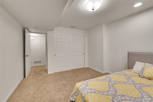 2972 W Long Dr Unit C, Littleton, CO 80120 - bedroom with light colored carpet and a closet