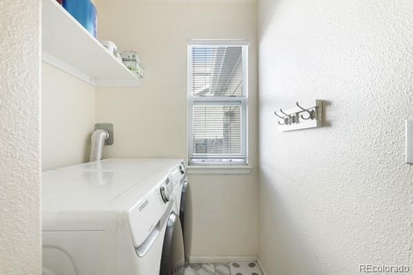 laundry room featuring independent washer and dryer