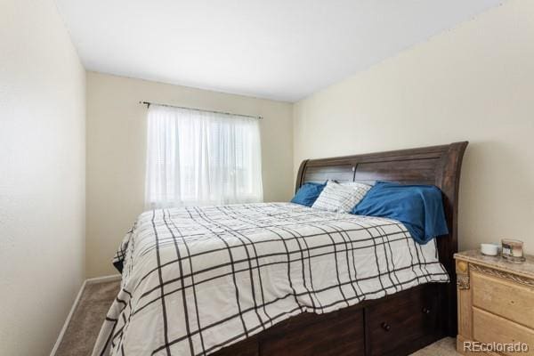 bedroom featuring carpet floors