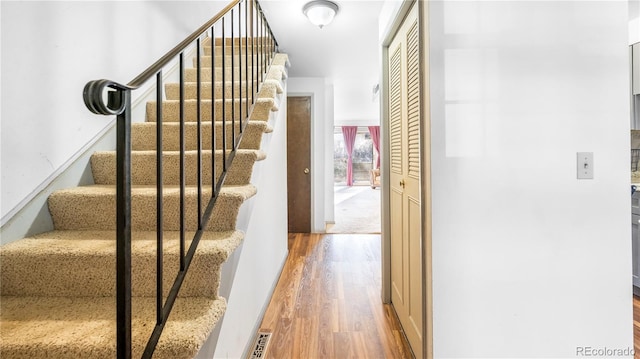 1200 S Monaco St Parkway Unit 31, Denver, CO 80224 - stairway with wood finished floors