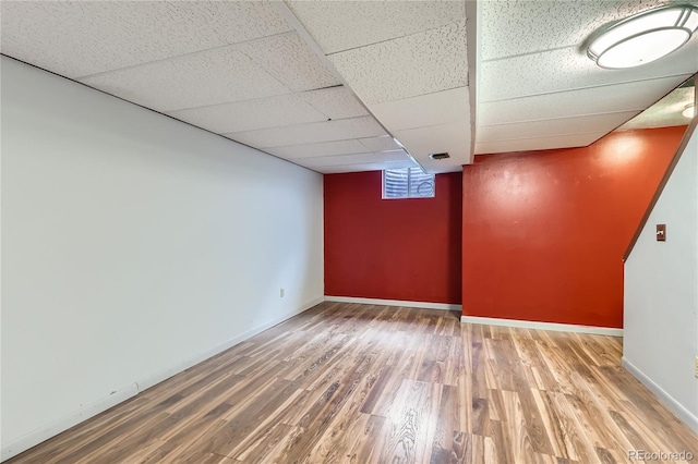 1200 S Monaco St Parkway Unit 31, Denver, CO 80224 - below grade area with wood finished floors and a drop ceiling
