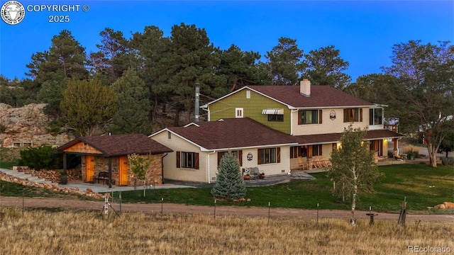 6100 Waterbarrel Rd, Beulah, CO 81023 - view of front of property featuring a chimney, covered porch, and a front yard