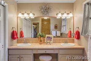 6100 Waterbarrel Rd, Beulah, CO 81023 - full bathroom featuring double vanity