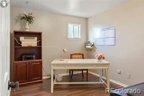 6100 Waterbarrel Rd, Beulah, CO 81023 - office area featuring wood finished floors and baseboards