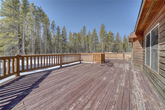 deck with a wooded view