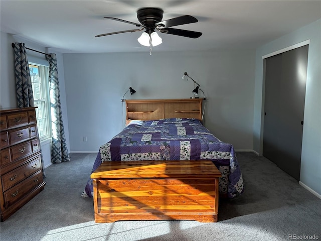 carpeted bedroom with ceiling fan