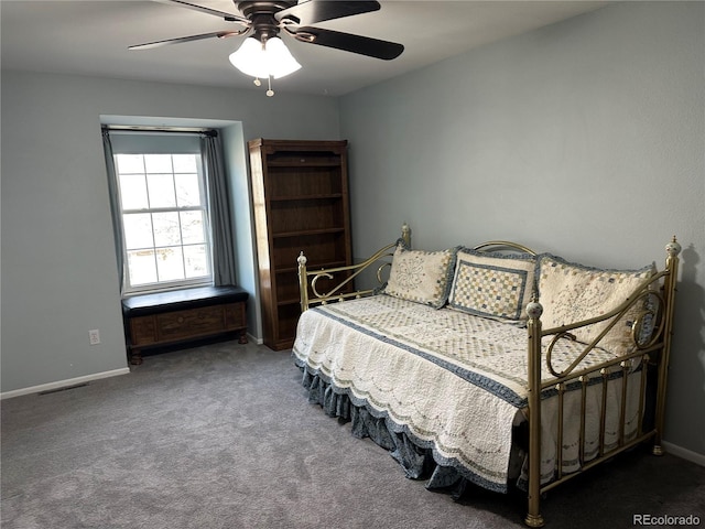 bedroom with ceiling fan and carpet