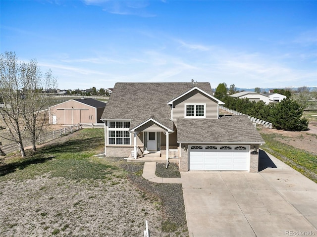16275 Electra St, Brighton, CO 80603 - view of front of house with fence, roof with shingles, an attached garage, brick siding, and concrete driveway