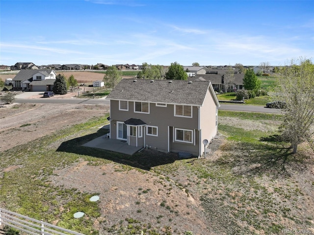 16275 Electra St, Brighton, CO 80603 - view of front of home with fence and a residential view