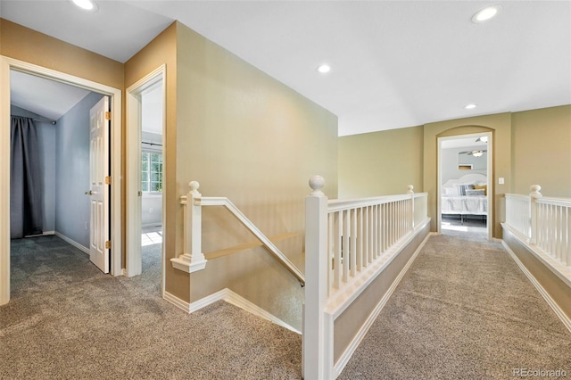 4253 Lark Sparrow St, Highlands Ranch, CO 80126 - corridor featuring an upstairs landing, carpet, and recessed lighting
