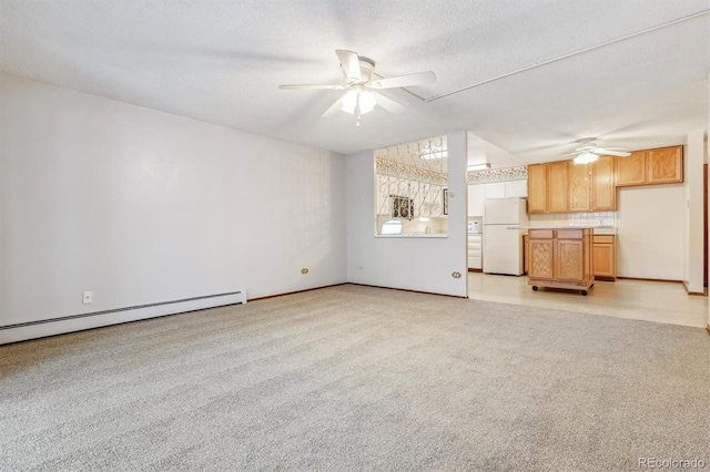 unfurnished living room featuring light carpet, a textured ceiling, a baseboard radiator, and ceiling fan