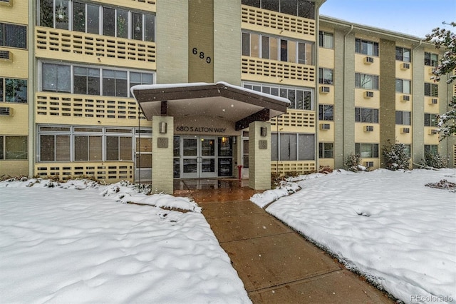 view of snow covered property