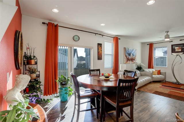 dining room with a wealth of natural light, recessed lighting, and wood-type flooring