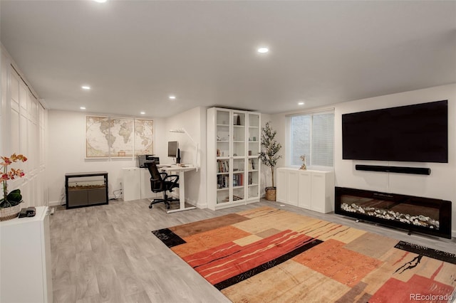 living area featuring recessed lighting and wood finished floors