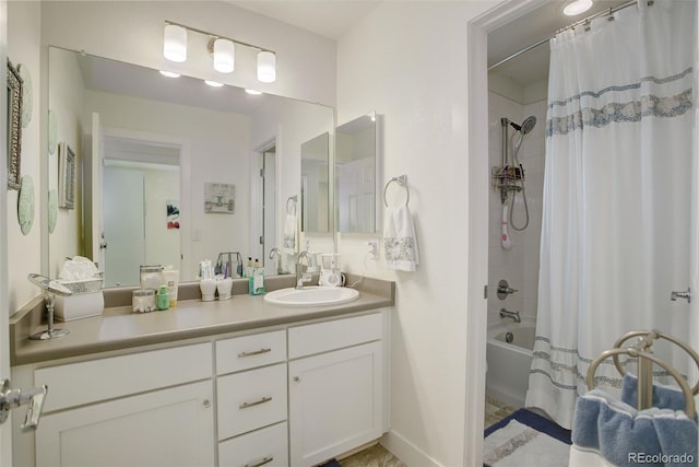 bathroom featuring vanity and shower / tub combo with curtain