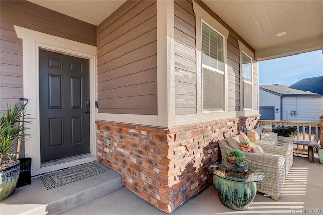 property entrance featuring brick siding