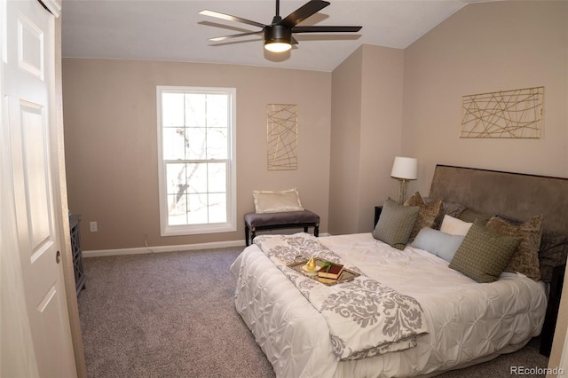 carpeted bedroom featuring ceiling fan and vaulted ceiling