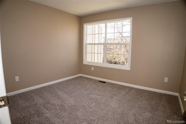 unfurnished room with carpet