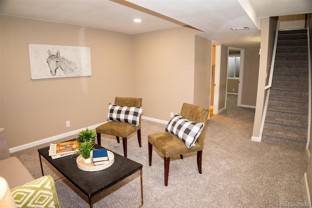 sitting room with carpet flooring