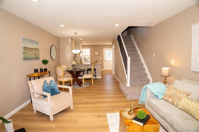 living room with light hardwood / wood-style floors